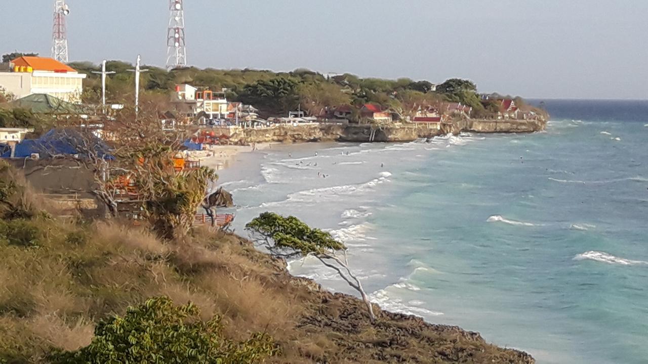 Penginapan Asidik Bira Exterior foto