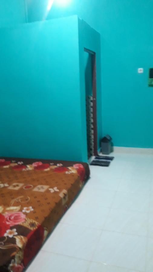 Penginapan Asidik Bira Exterior foto