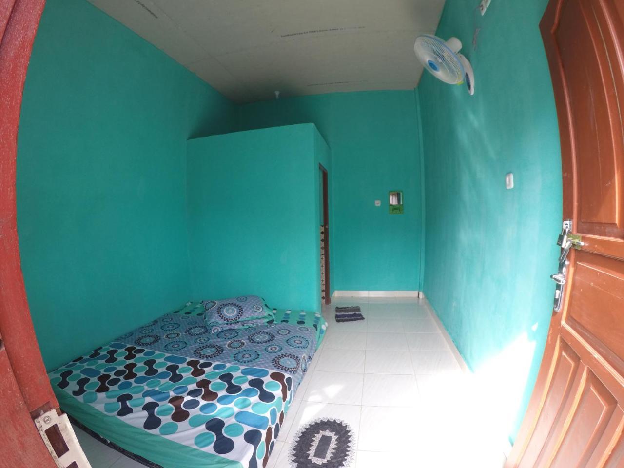Penginapan Asidik Bira Exterior foto