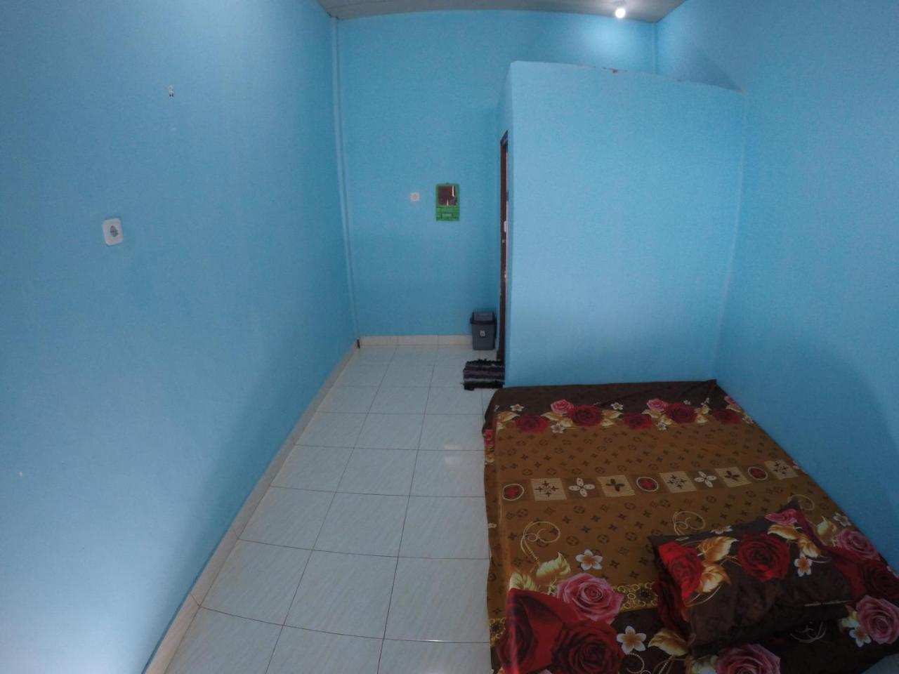 Penginapan Asidik Bira Exterior foto